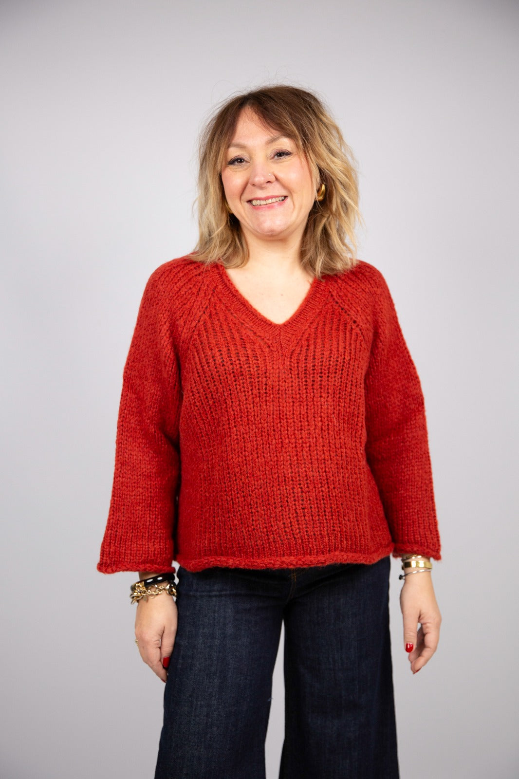 Arita maglia collo V manica campana