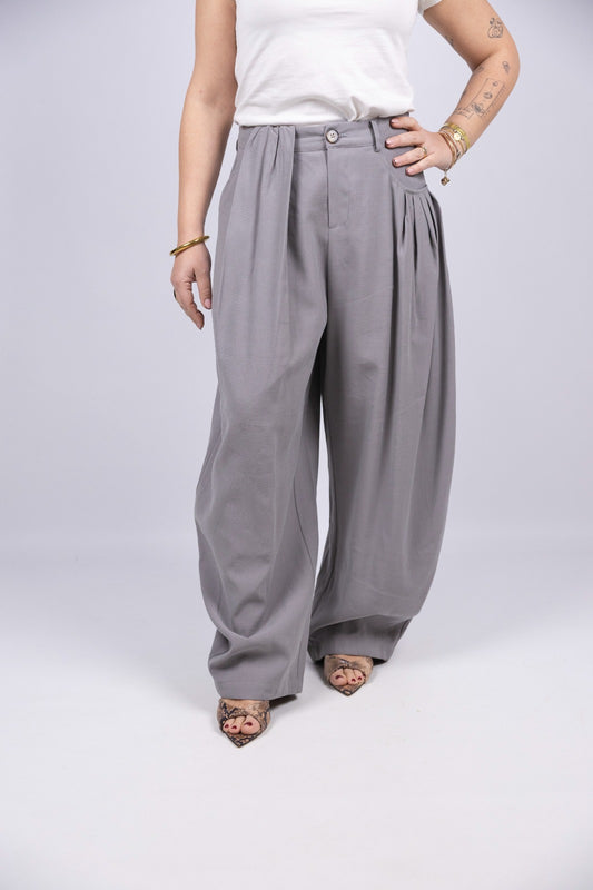 Atelier55 pantalone grigio con tasche asimmetriche