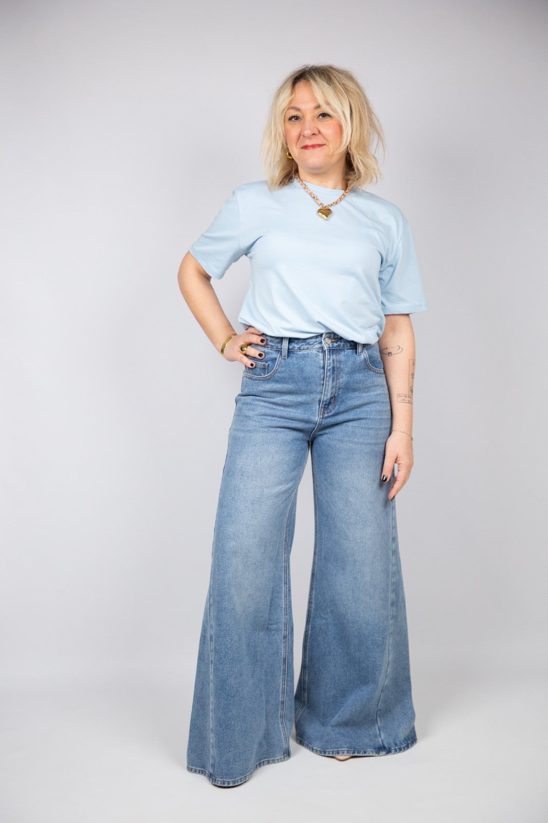 Kaos jeans extra flare lavaggio medio