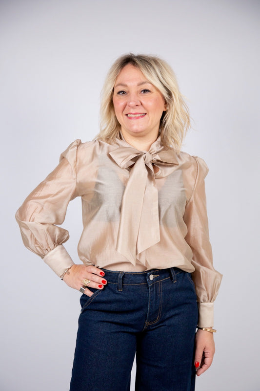 Kaos blusa con fiocco champagne