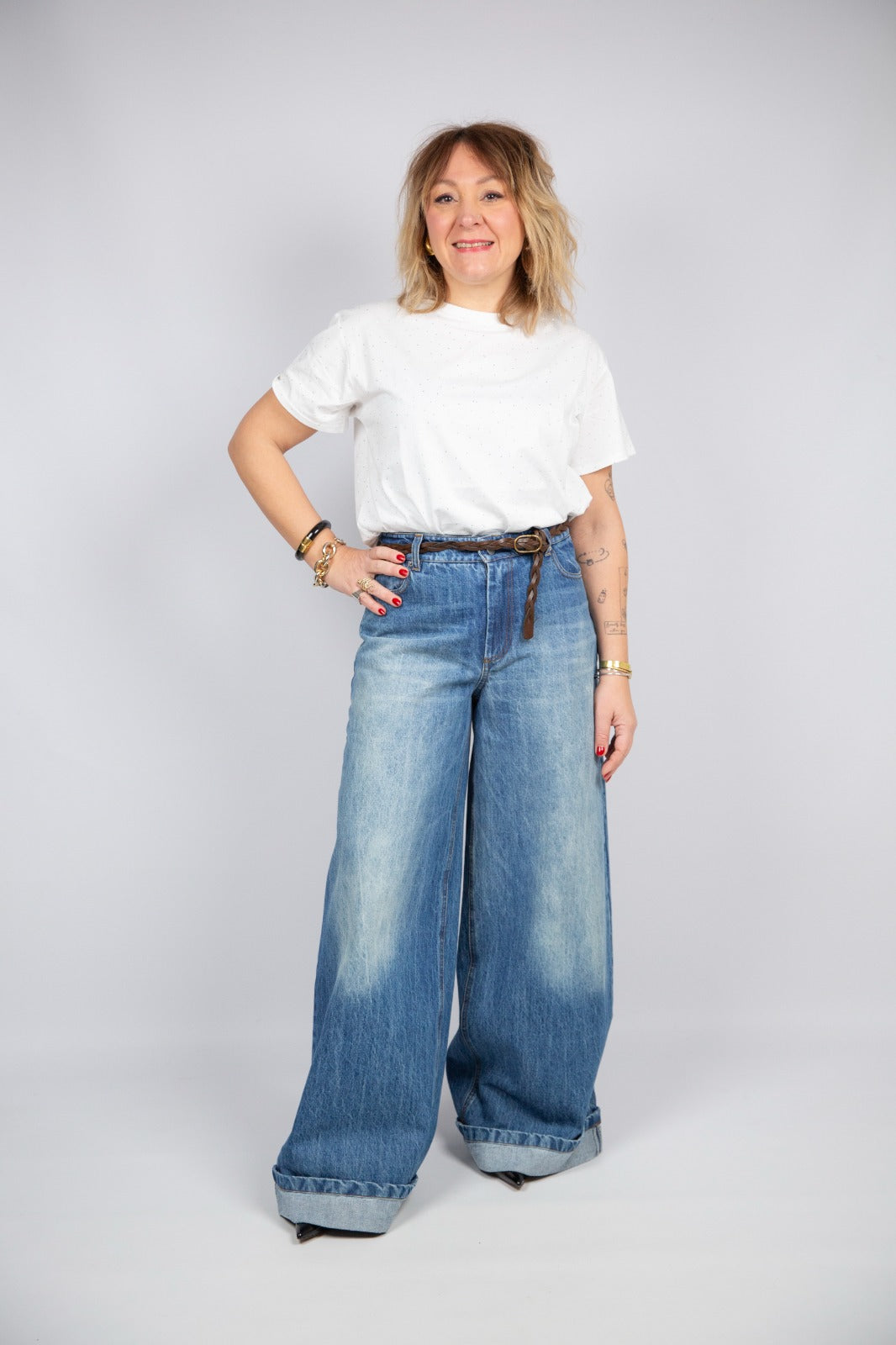 Motel diffusione moda jeans wide con risvolto e cintura