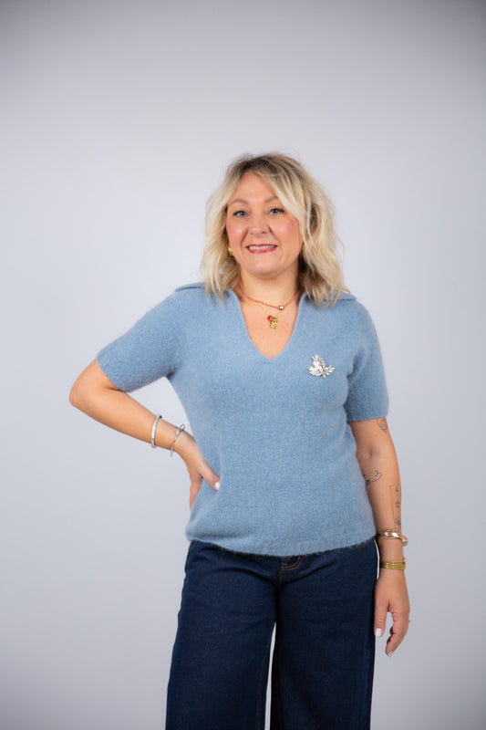 Kaos polo misto lana con spilla