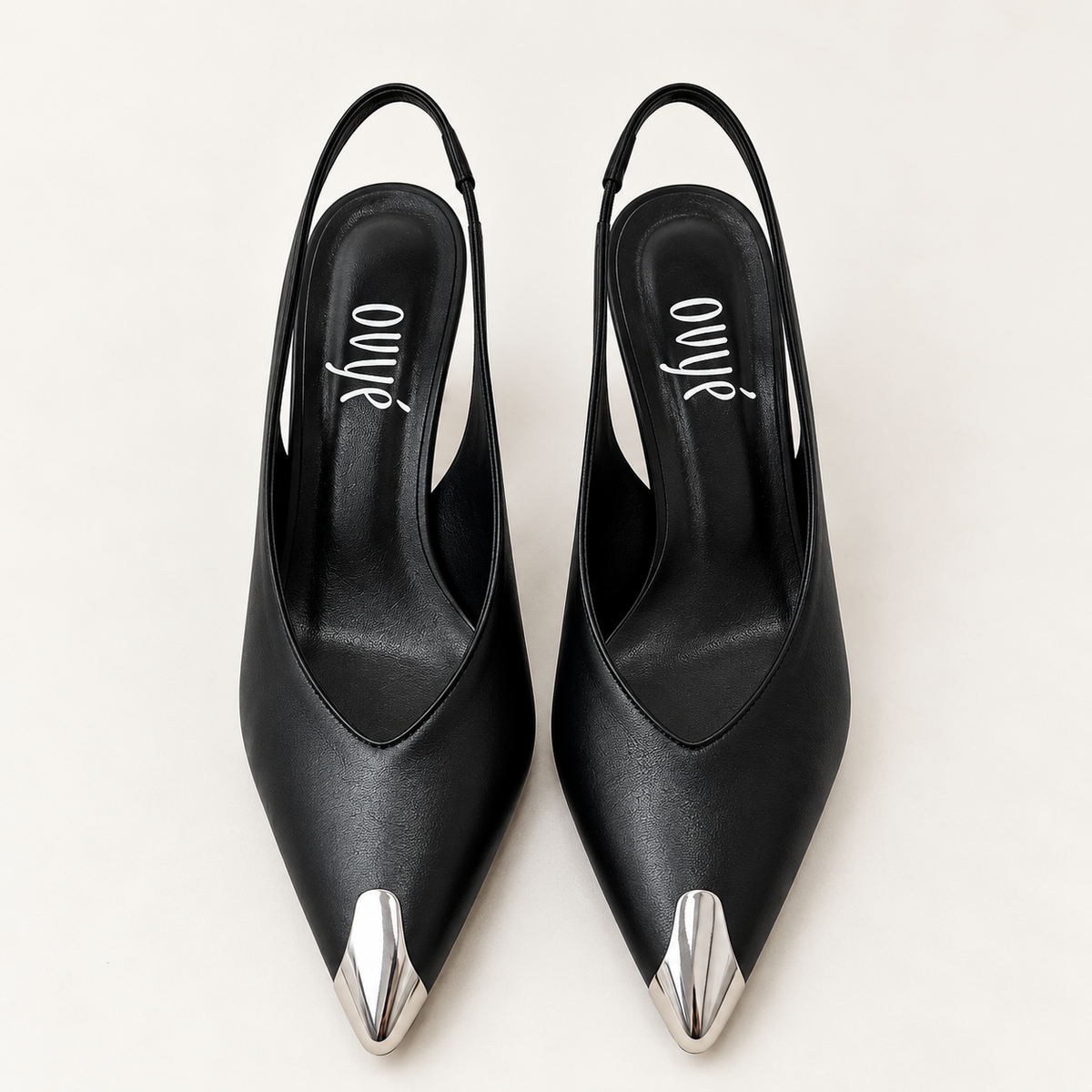Ovyè slingback nera con dettaglio punta in metallo argento