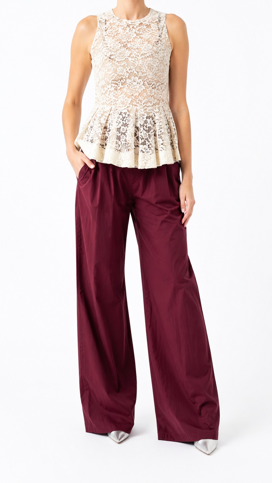 Motel top con peplo in pizzo cipria